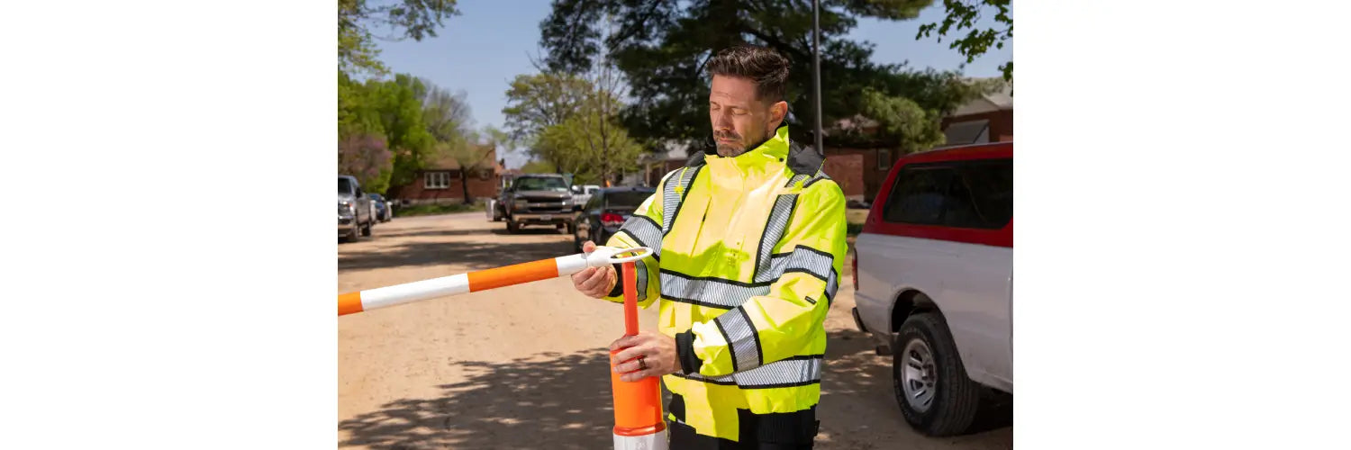 High visibility safety clothing men on road