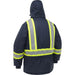 Navy safety jacket with reflective yellow and gray stripes on a white background